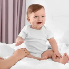 Jak dziecko uczy się siadać - kluczowe etapy i pomocne wskazówki